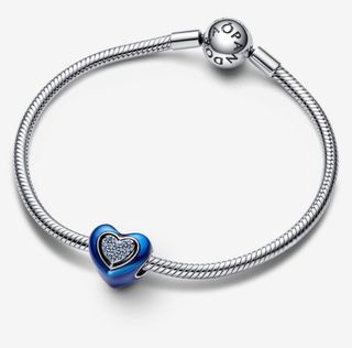 Charm corazón giratorio azul