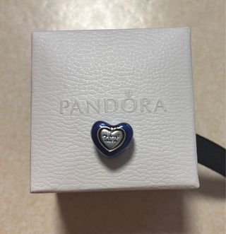 Charm corazón giratorio azul