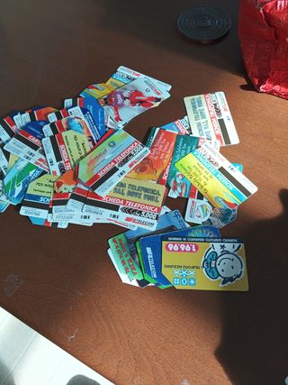 60 schede telefoniche in lire con pezzi