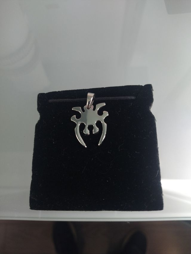 Lote tres colgantes de acero con cordon