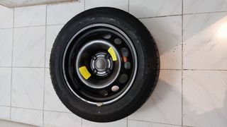 Neumático con llanta. 