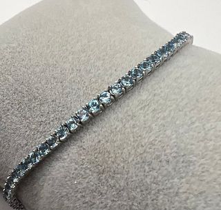 Pulsera riviere de oro de 18 kt con aguamarinas 