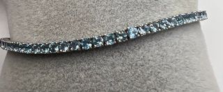 Pulsera riviere de oro de 18 kt con aguamarinas 