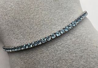Pulsera riviere de oro de 18 kt con aguamarinas 