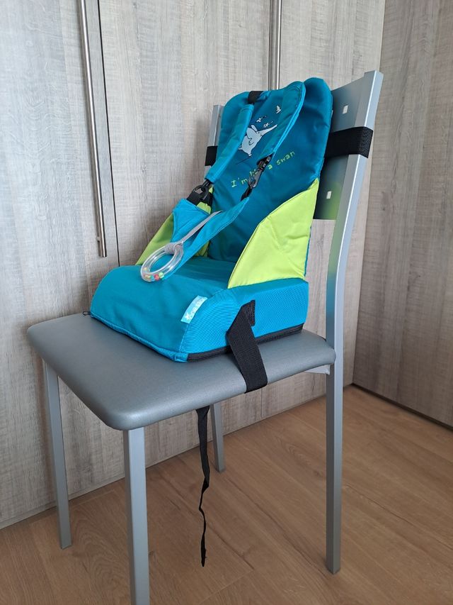 Trona de viaje con juego y bolsa de transporte 