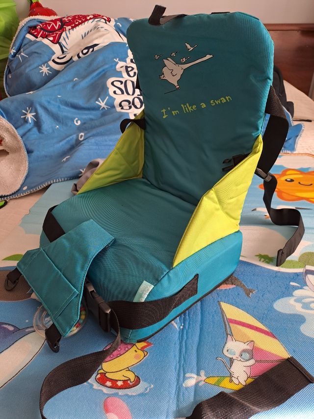 Trona de viaje con juego y bolsa de transporte 