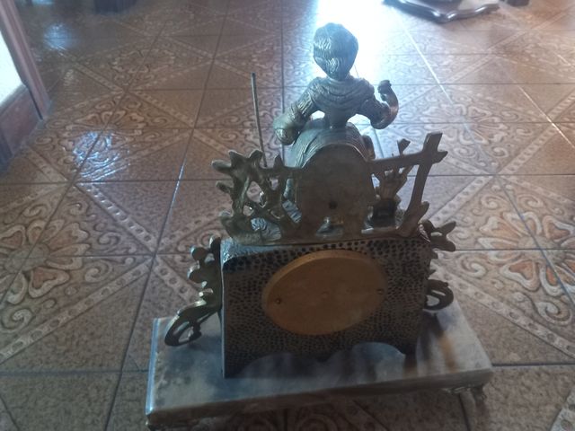 Reloj y candelabros bronce