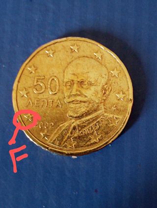 moneda de Grecia,50 cm€, del año 2002,