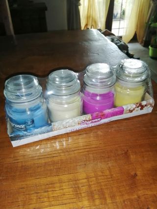 Bellissimo set di 4 candele in barattolo di vetro