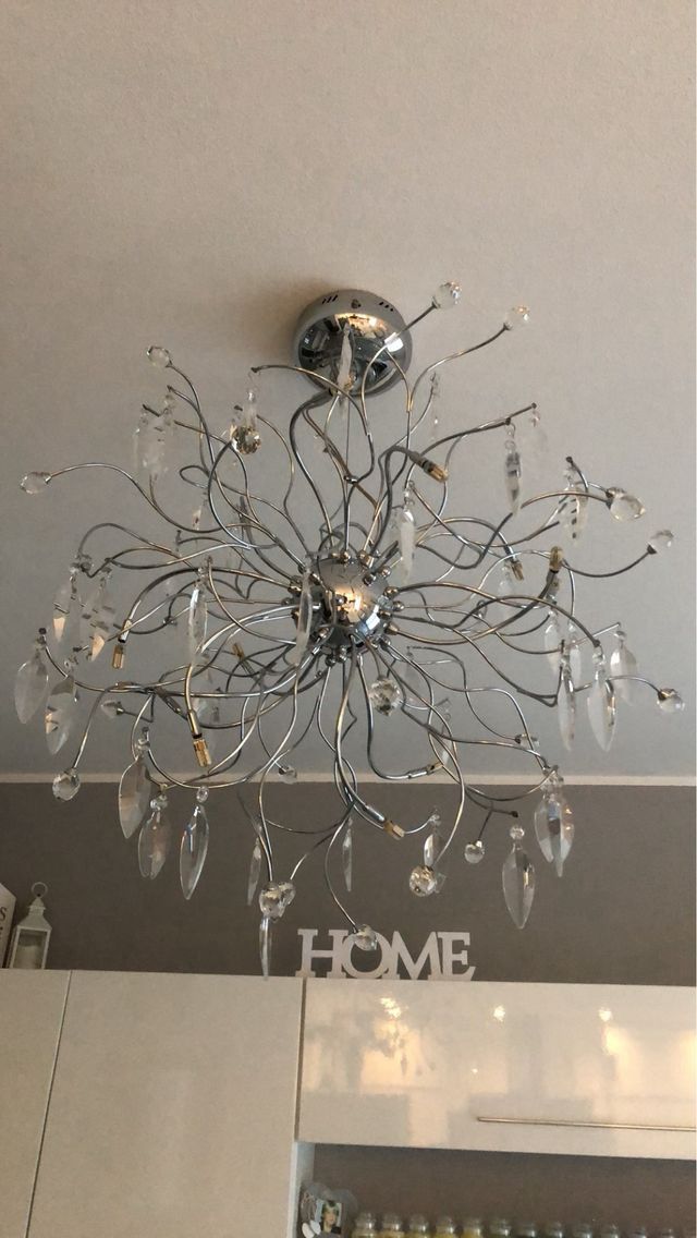 Lampadario a sospensione in acciaio e cristallo