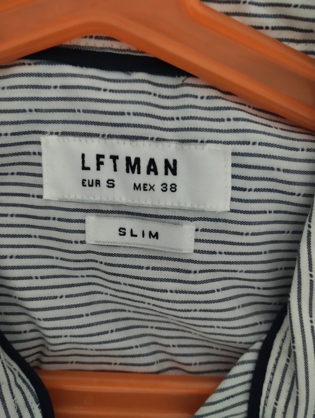 Camisa de rayas con coderas