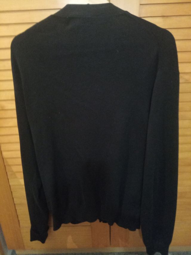 Chaqueta marca Polo para hombre con botonadura.