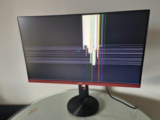 Monitor 27" AOC, funciona, pero pantalla averiada.