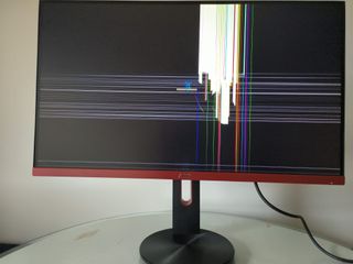 Monitor 27" AOC, funciona, pero pantalla averiada.