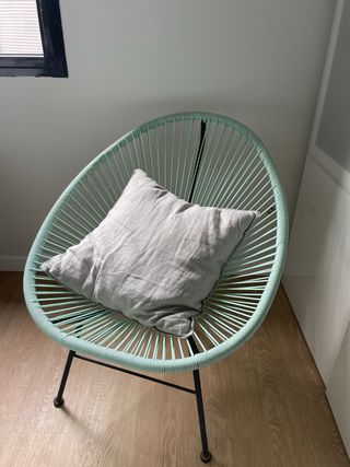 Butaca icónica azul turquesa