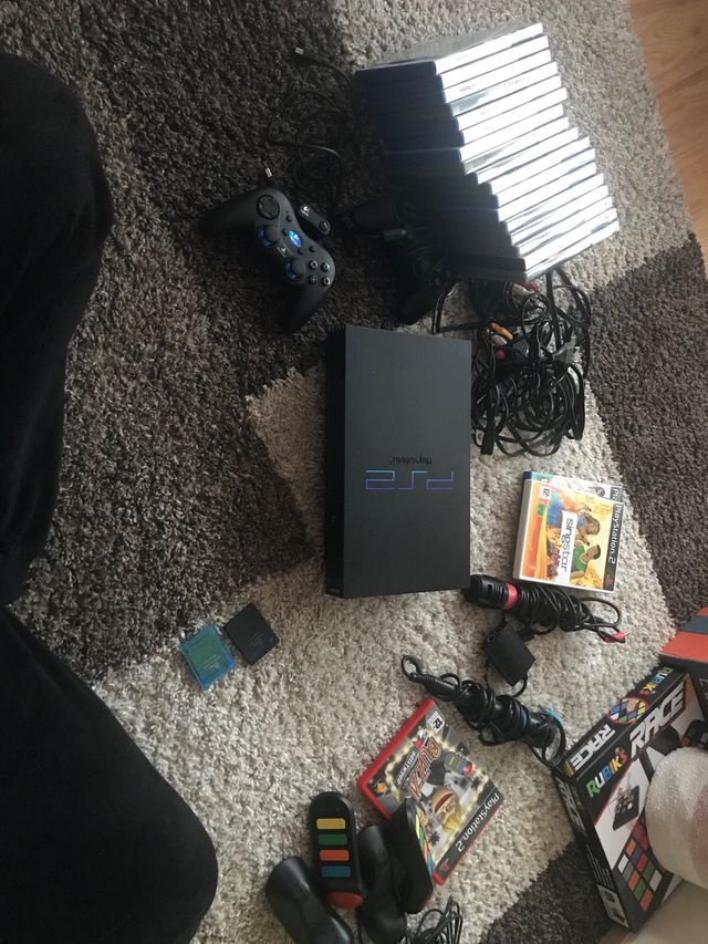 Play Station 2 BUZZ y Sing Stars