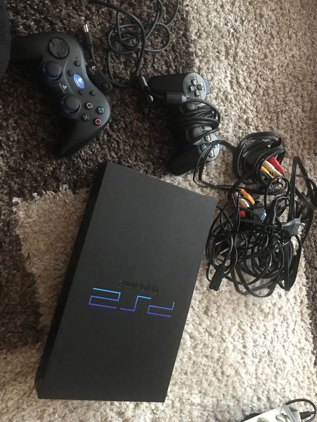 Play Station 2 BUZZ y Sing Stars