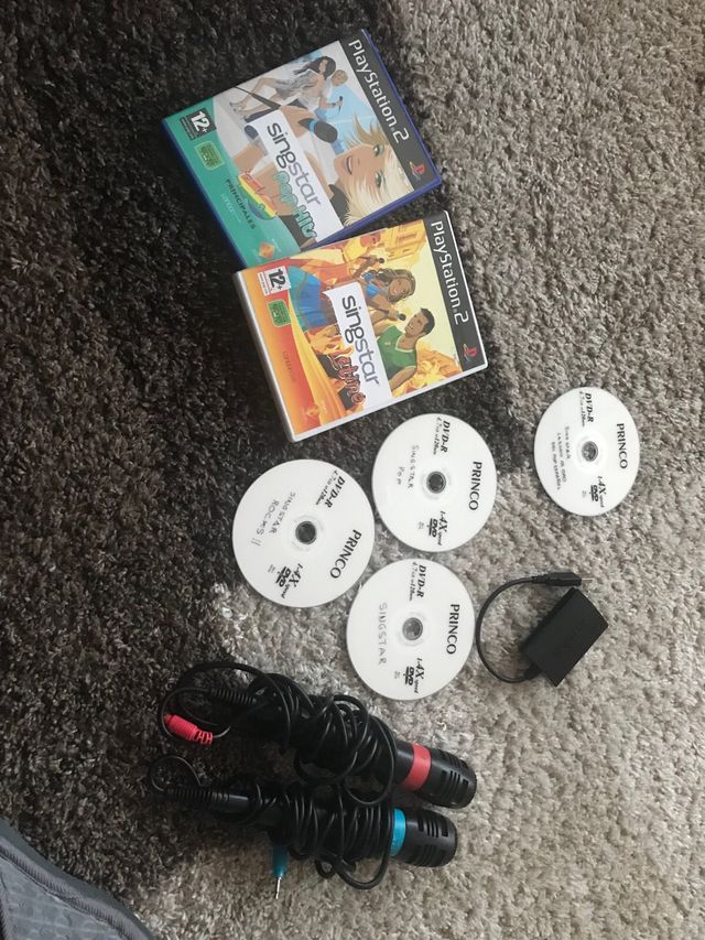 Play Station 2 BUZZ y Sing Stars