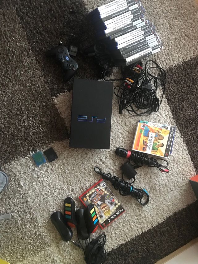 Play Station 2 BUZZ y Sing Stars