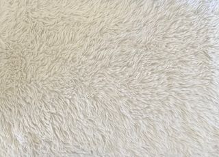 Tappeto a pelo lungo in pelliccia sintetica