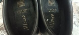 Zapatos negros de Alonso