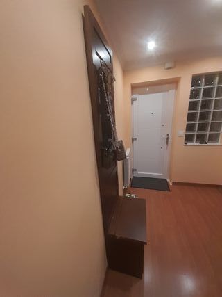 Perchero, mueble de entrada.