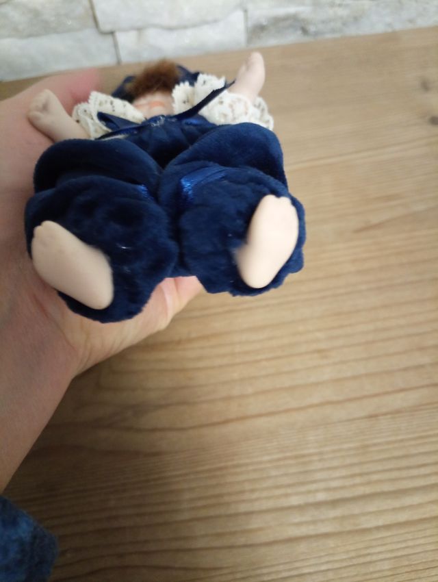 Bambola da collezione in porcellana