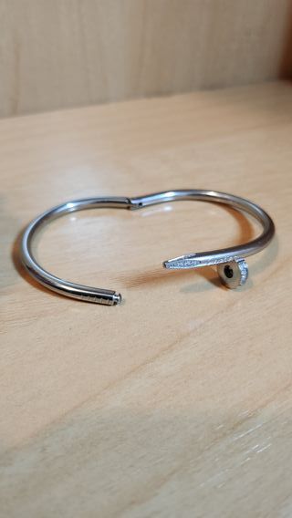 Cartier pulsera y pendientes