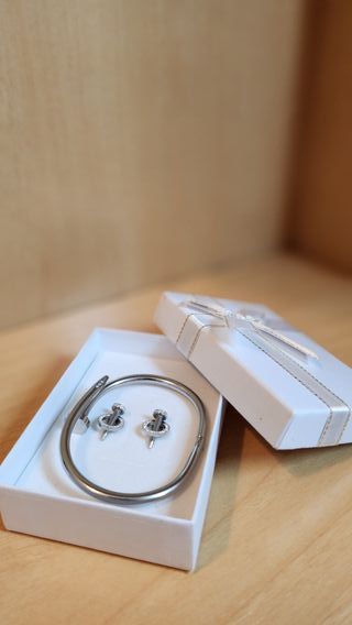 Cartier pulsera y pendientes