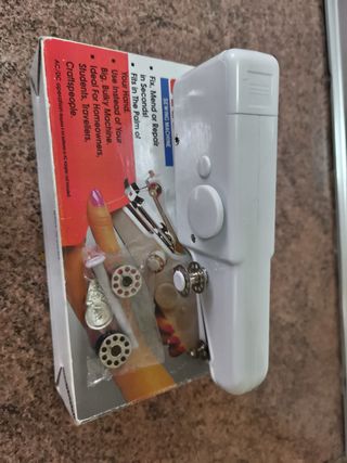 Maquina de coser portátil