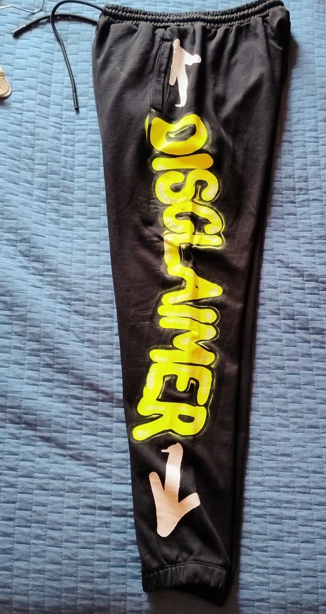 Pantaloni Disclaimer