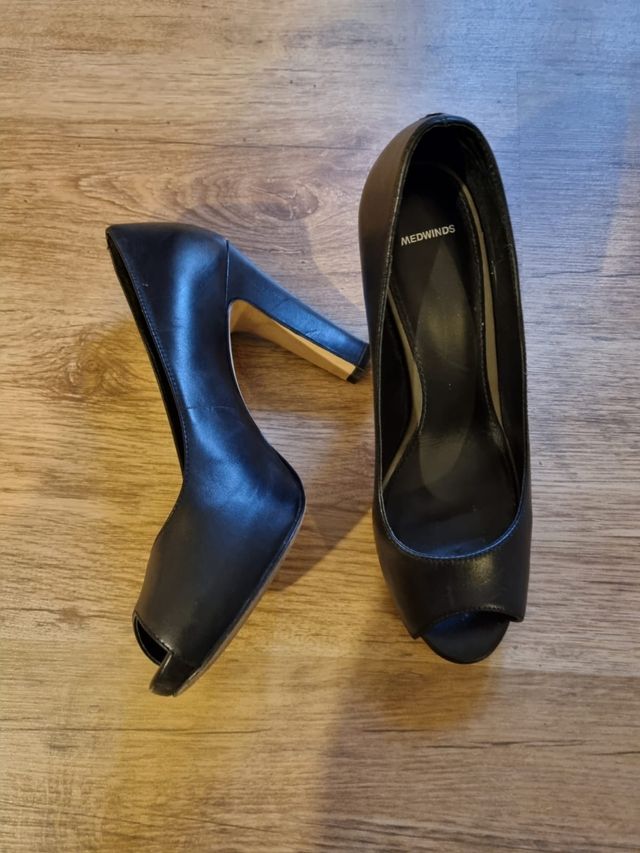 Scarpe in pelle nera. Come nuove