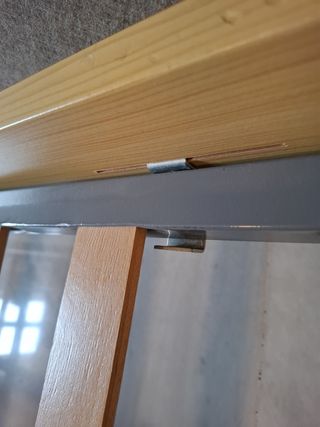 Cama de madera con somier de láminas