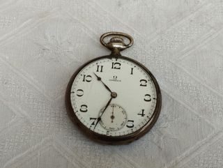 Antico orologio da tasca Omega in argento funziona