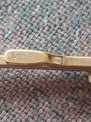 Pisacorbatas plata bañado oro