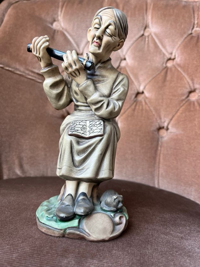 Figura porcelana flautista