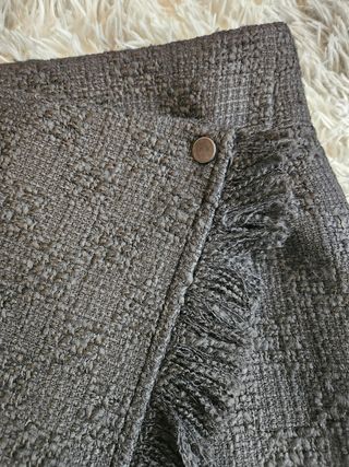Minifalda negra flecos