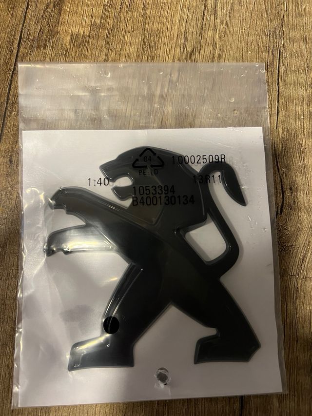 Simbolo frontal peugeot preto