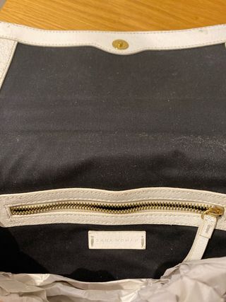 Elegante cartera mano piel Zara