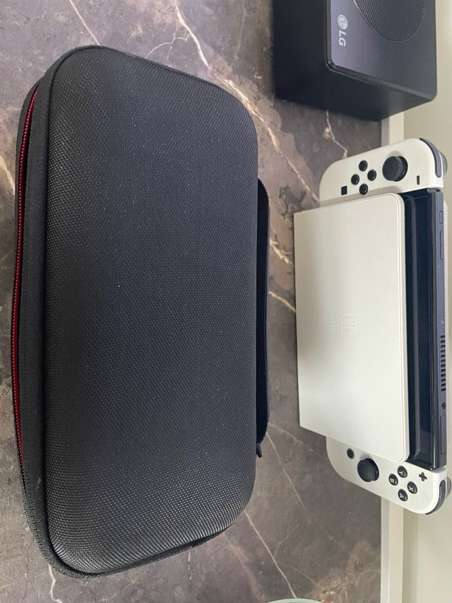 Nintendo Switch Oled con accesorios y juegos!