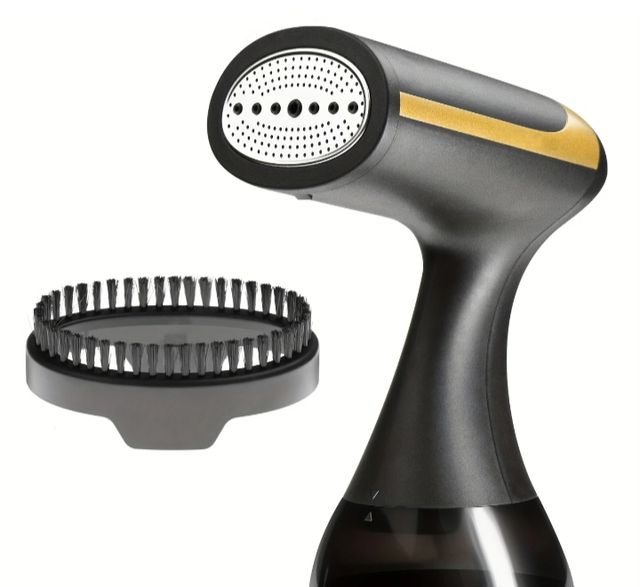 Plancha portátil de mano con vapor.