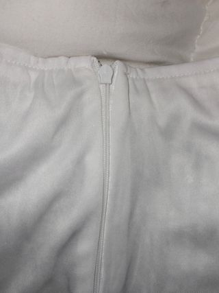 Minifalda lentejuelas y plumas