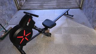 Máquina de remo plegable