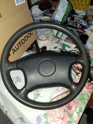 Volante Suzuki original desplazado