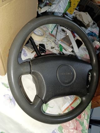 Volante Suzuki original desplazado
