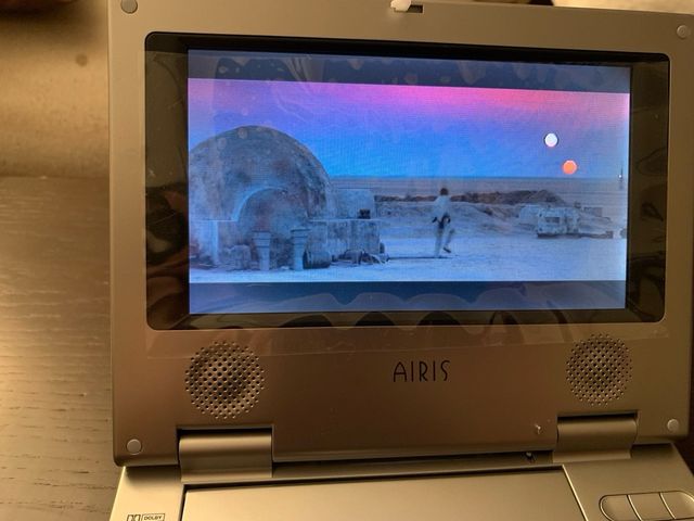 DVD portátil AIRIS con funda y caja original