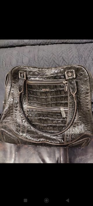 Bolso prüne buen estado piel negro