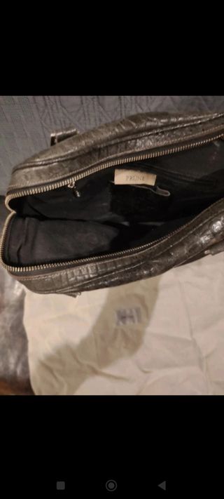 Bolso prüne buen estado piel negro