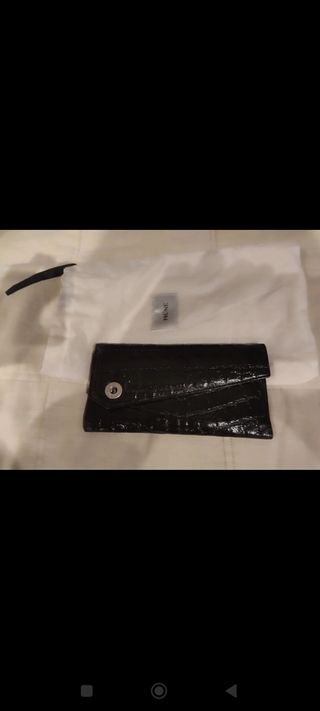 Cartera prüne negra piel a estrenar 