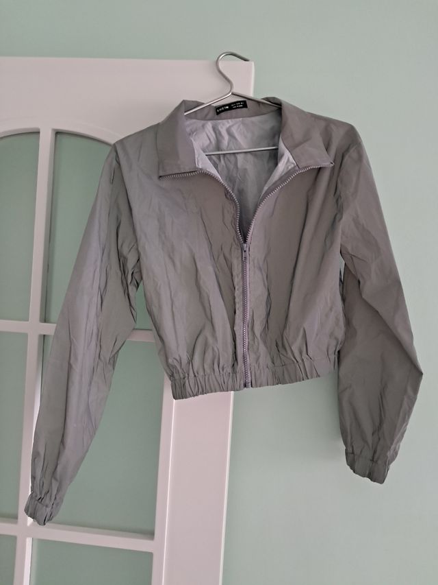 Cortavientos tejido reflectante